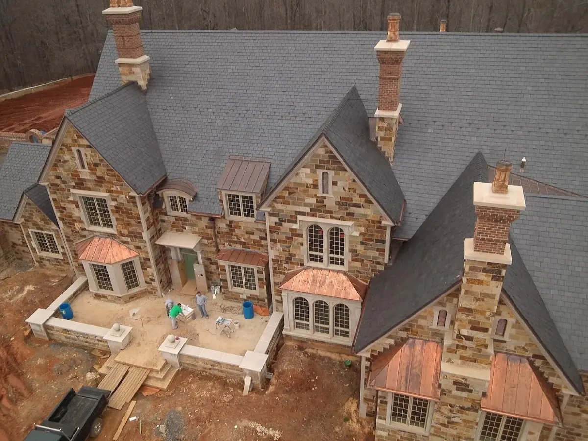 Craftsman Roofing Slate Roof Repair project in Belford Manor